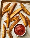 how-to-make-easy-oven-baked-potato-wedges-kitchn image