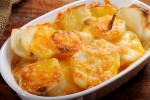 easy-microwaved-potatoes-au-gratin-recipe-the-spruce image