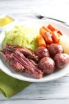 corned-beef-and-cabbage-with-the-fixins-stuck-on image