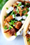authentic-carnitas-recipe-tacos-de-carnitas-the image