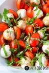 caprese-salad-with-cherry-tomatoes-salty-side-dish image
