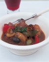 spanish-braised-pork-with-potatoes-and-olives image