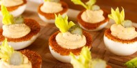 how-to-make-bloody-mary-deviled-eggs-delish image
