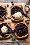 bursting-blueberry-lemon-thyme-tarts-half-baked image