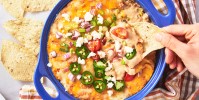 best-refried-bean-dip-recipe-how-to-make-delish image