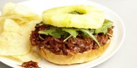 slow-cooker-hawaiian-pulled-pork-sandwiches-delish image