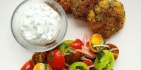 crispy-chickpea-fritters-with-tzatziki-and-tomato-salad image
