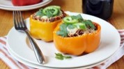 chorizo-stuffed-bell-peppers-recipe-tablespooncom image