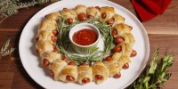 how-to-make-pigs-in-a-blanket-wreath-delish image