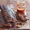 grilled-baby-back-ribs-with-citrus-barbecue-sauce image