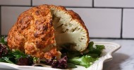 spicy-whole-roasted-cauliflower-recipe-purewow image
