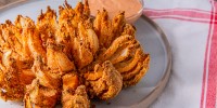 how-to-make-air-fryer-blooming-onion-delish image