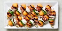 how-to-make-melon-prosciutto-skewers-delish image