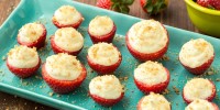best-cheesecake-stuffed-strawberries-delish image