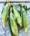 how-to-shuck-corn-quickly-and-cleanly-kitchn image