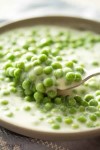 easy-creamed-peas-simple-holiday-side-dish image
