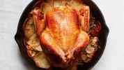 cast-iron-roast-chicken-with-crispy-potatoes-bon-apptit image