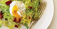 frise-poached-egg-and-bacon-salad-salade-lyonnaise image