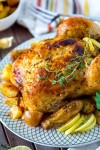 oven-roasted-whole-chicken-with-lemon-and-thyme image
