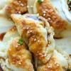 sesame-chicken-potstickers-damn-delicious image