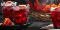 how-to-make-pomegranate-rum-punch-country-living image