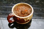 slow-cooker-lentil-soup-with-sausage-and-tomatoes image