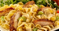 scallops-in-white-wine-sauce-with-pasta image