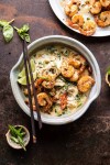 saucy-garlic-butter-shrimp-with-coconut-milk-and-rice image