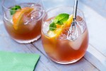 summer-peach-iced-tea-cocktail-recipe-the-spruce-eats image