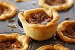 13-great-canadian-butter-tart-recipes-food-network image