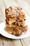 gooey-salted-caramel-chocolate-chip-cookie-bars image