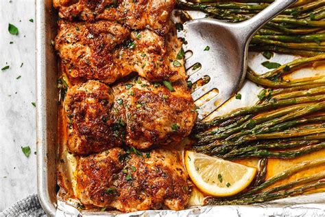 oven-baked-chicken-thighs-recipe-with-asparagus-eatwell101 image