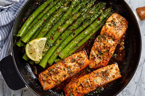 garlic-butter-salmon-recipe-with-lemon-asparagus image