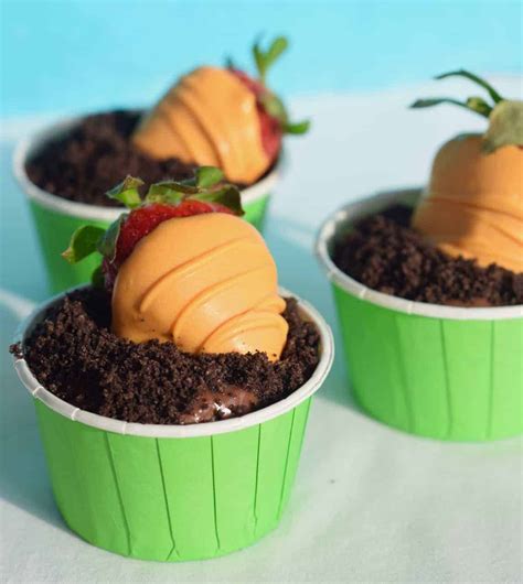 chocolate-covered-strawberry-carrots-in-dirt-cups image