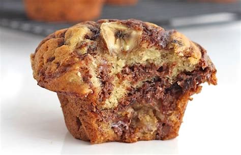 nutella-swirled-banana-muffins-the-bakermama image