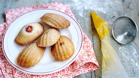 madeleines-with-lemon-curd-recipe-bbc-food image