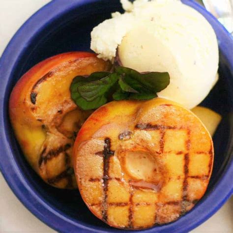 grilled-peach-with-brandy-sauce-bush-cooking image