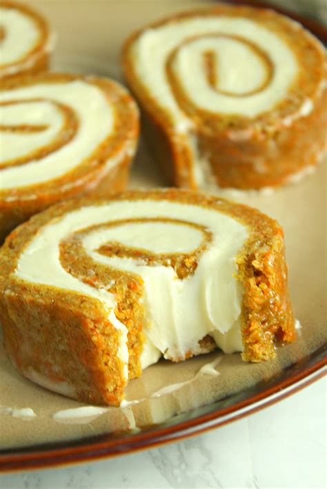 carrot-cake-roll-with-cream-cheese-frosting-filling image