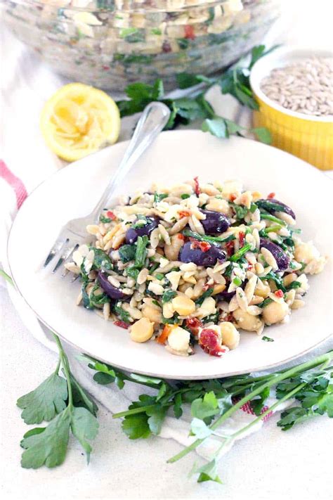 mediterranean-chickpea-and-orzo-salad-bowl-of-delicious image