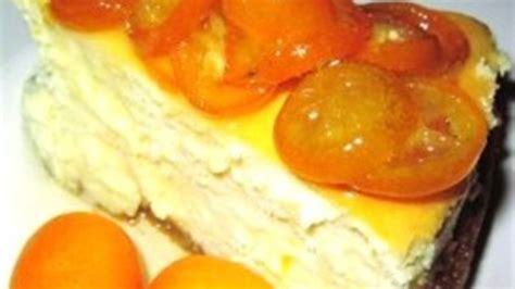 orange-cheesecake-with-candied-kumquats image