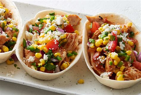 slow-cooker-chipotle-chicken-taco-bowls-with-corn image