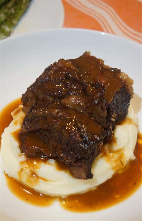 slow-cooker-beef-short-ribs-in-red-wine-sauce-a-food image