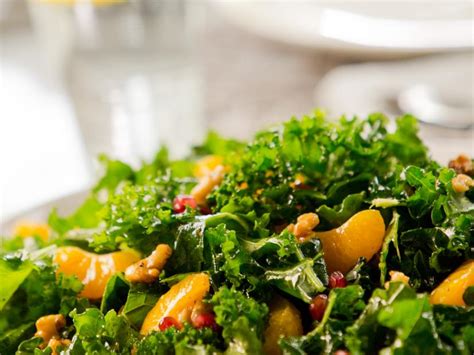 green-salad-with-tangerines-and-pomegranate-seeds image