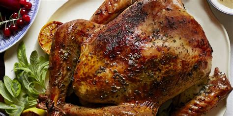 herb-and-citrus-butter-roasted-turkey-country-living image