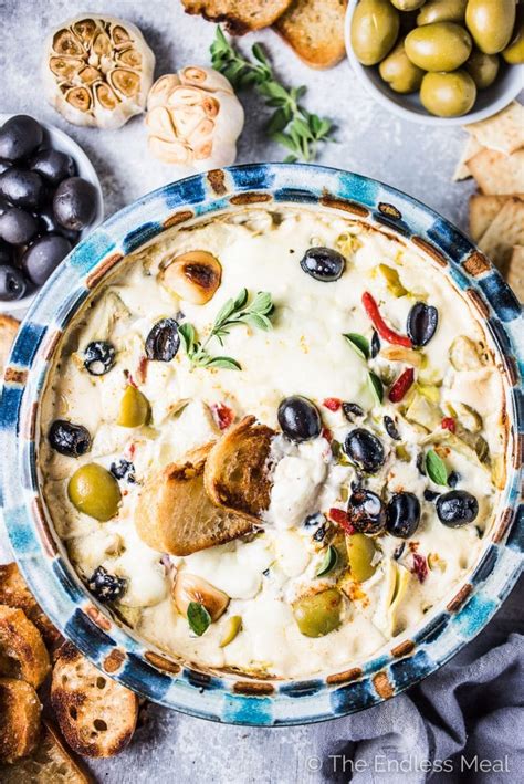 cheesy-roasted-garlic-artichoke-olive-dip-the-endless-meal image