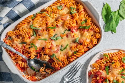 rotini-bake-recipe-with-tomatoes-and-cheese-the image