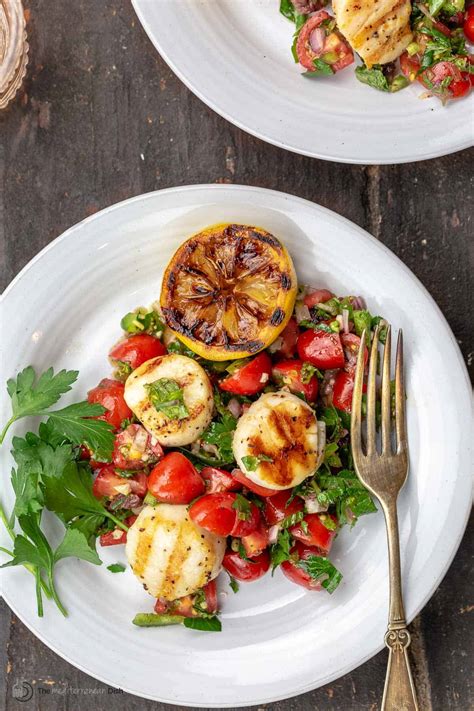grilled-scallops-with-mediterranean-tomato-salsa image