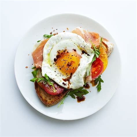fried-egg-prosciutto-and-arugula-breakfast-toast image