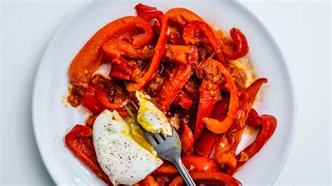 poached-eggs-in-tunisian-style-red-pepper-sauce image