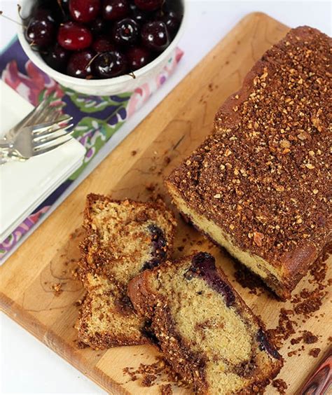 cinnamon-bread-with-cherries-and-almonds-creative image